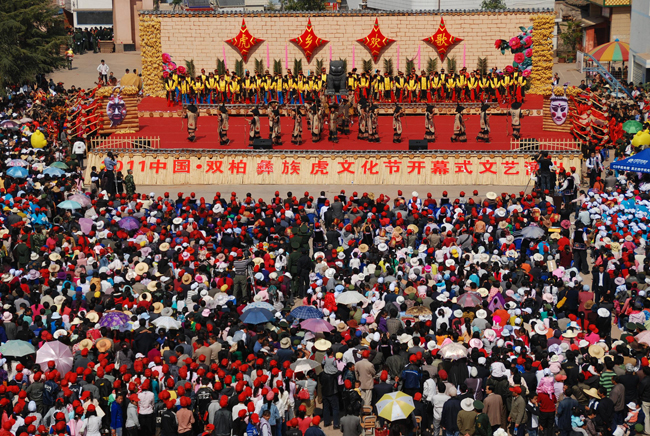 yi people tiger dance festival